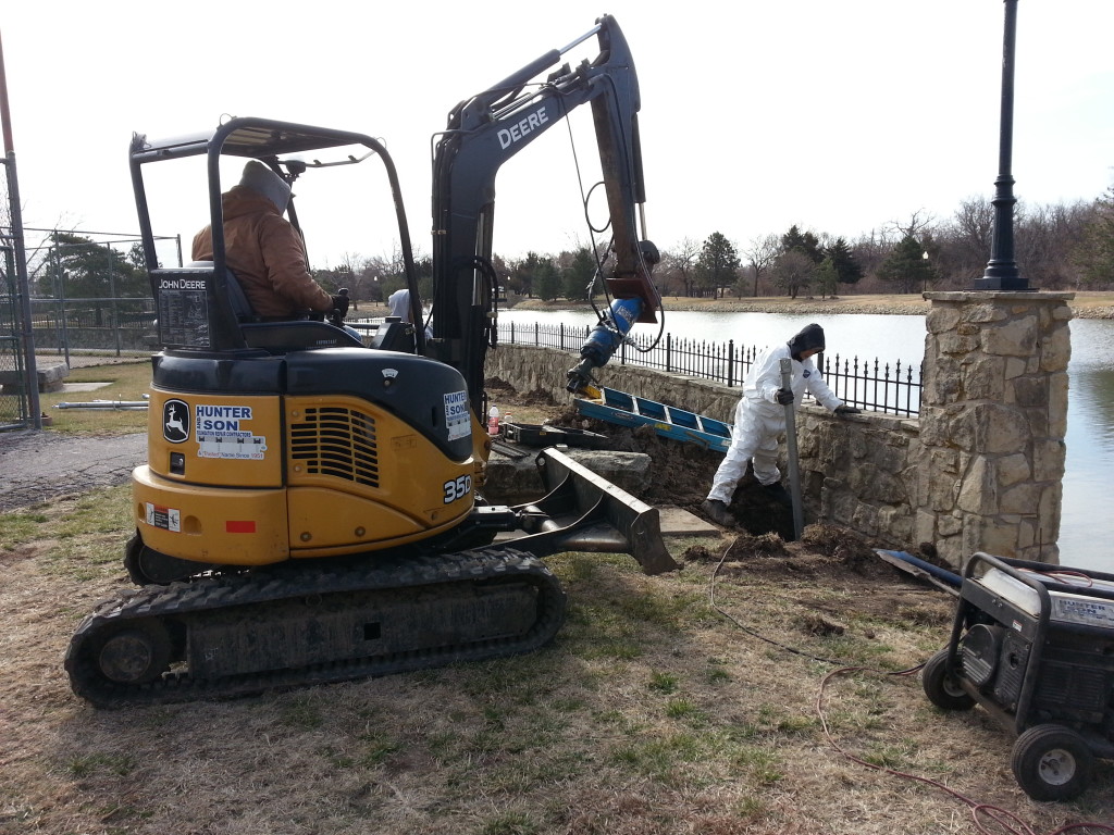 Helical Pier Installation on Stone Wall at Hunter and Son in Wichita, Kansas